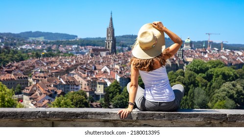 Bern in Switzerland- panoramic view of city with woman