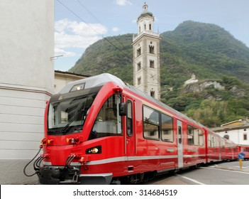 Bernina Express Train Arriving At Tirano On Italy.