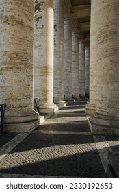 Berninis Colonnade surrounding Saint Peters square in the Vatican.