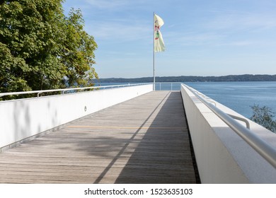 BERNRIED, BAVARIA / GERMANY - Sept 20, 2019: View from a balcony (part of "Buchheim Museum of Phantasy") towards lake Starnberg. With some imagination it seems one can directly walk onto the lake.