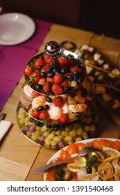 Berries And Fruit Centerpiece On A Banquet Table 