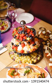 Berries And Fruit Centerpiece On A Banquet Table 