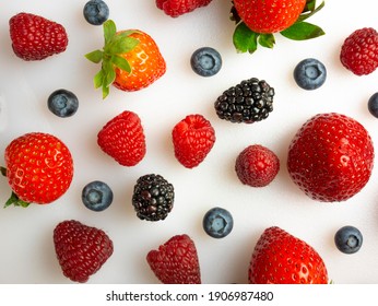 Berries Isolated On White Background. Forest Fruit: Strawberries, Raspberries, Blackberries And Blueberries. Top View. Flat Lay. 