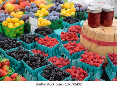 Berries and preserves at outdoor farmers market - Powered by Shutterstock