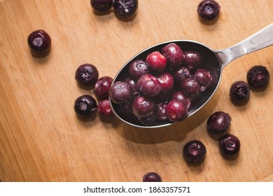 Berries rolling on the table