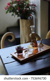 Berries Tea With Ice Ball On Wood Background