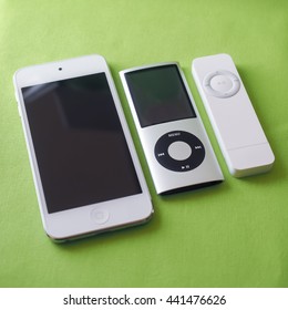 BERRY, AUSTRALIA - June 23 2016 : Three Apple iPods (left to right) - iPod Touch 5th generation, iPod Nano 4th generation and iPod Shuffle 1st generation.