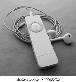 BERRY, AUSTRALIA - JUNE 28 2016 : An Apple IPod Shuffle, First Generation, With Apple Earpods Attached, In Black And White.