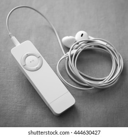 BERRY, AUSTRALIA - JUNE 28 2016 : An Apple IPod Shuffle, First Generation, With Apple Earpods Attached, In Black And White.