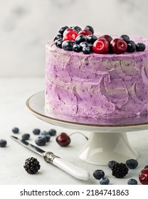 Berry Cake, Berry Sponge Cake With Fresh Berries And Sour Cream On A White Background