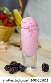 Berry Ice Cream Scoops In Tall Dessert Glass. 