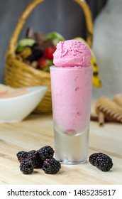 Berry Ice Cream Scoops In Tall Dessert Glass. 