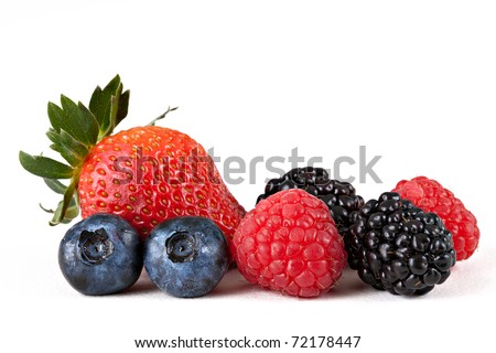 Berry Mix Macro: Strawberry, Blueberries, Raspberries and Blackberries Isolated Against White Background