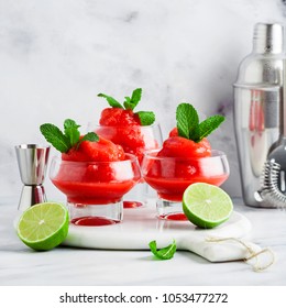 Berry Slushie With Lime, Summer Refreshing Drink In Serving Glasses. Bartender Tools In The Background