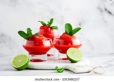 Berry Slushie With Lime, Summer Refreshing Drink In Serving Glasses. 