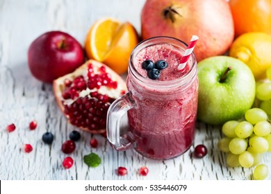 Berry smoothie, healthy juicy vitamin drink diet or vegan food concept, fresh vitamins, homemade refreshing fruit beverage - Shutterstock ID 535446079