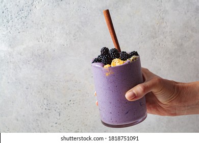 Berry Smoothie With Peanut Butter And Hemp Seeds In A Glass. Healthy Vegan Food Concept.