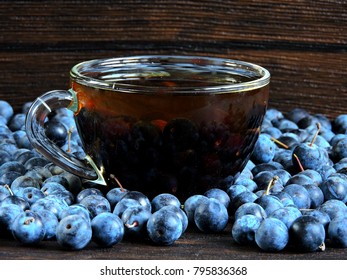 Berry Tea Cup Of Blackthorn. Blackthorn Berries. Copy Space.