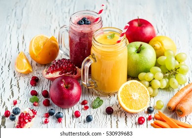 Berry and vegetables  smoothie, healthy juicy vitamin drink diet or vegan food concept, fresh vitamins, homemade refreshing fruit beverage - Shutterstock ID 530939683