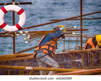 Berth building under construction with workers