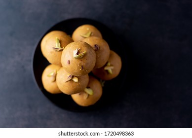 Besan Ladoo On A Black Plate