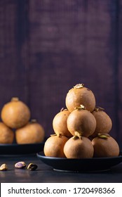 Besan Ladoo On A Black Plate