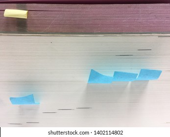 Beside, Thick Book Side With Blue Label Paper Tag