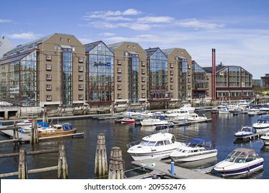 Besides The Old Traditional Warehouses  In The Immediate Neighborhood Located This Shopping Center In Trondheim