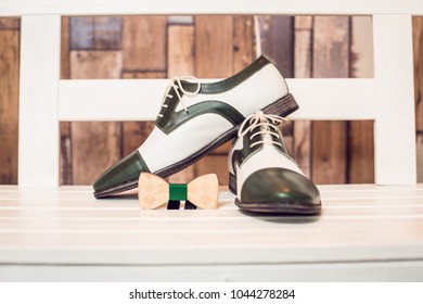 Bespoke Men's Shoes On A White Bench