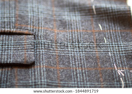 bespoke tailoring : Making of a beautiful wedding suit for groom made by fashion designer. This men groom suit tuxedo is tailor made to the measure