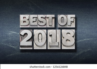 best of 2018 phrase made from metallic letterpress on dark jeans background