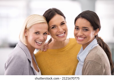 The Best In The Business. Cropped Portrait Of Three Businesswomen Standing In The Office.