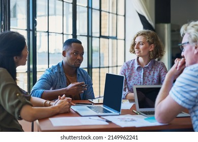 The Best Businesses Have The Best Talent. Shot Of A Diverse Group Of Businesspeople Having A Meeting In A Modern Office.