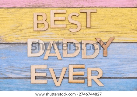 best daddy ever write on colors background 