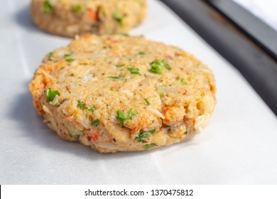 Best Fish Cakes Raw Uncooked On  Baking Tray. 
 Close Up Of Crab Patties. 