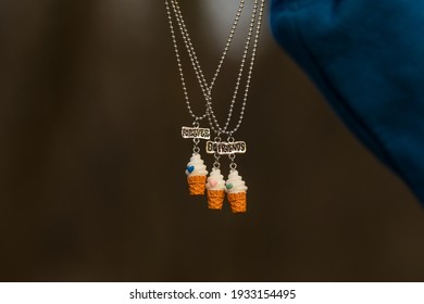 Best Friends Forever Necklace Pendant Shoot Outside In A Summer Day Closeup. Selective Focus
