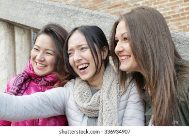 Best Friends - Happy Muti Ethnic Girls Laughing Together Taking Selfie - Young Trendy Hipster Girls Or  College Students Having Fun Together Smiling - Concept Of Fun Loving Friends Meeting Outdoors