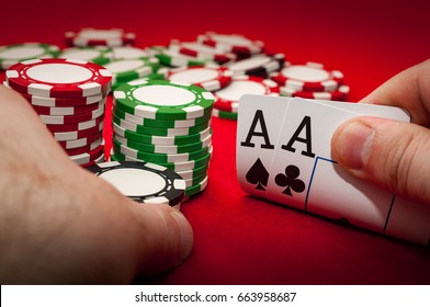 Best Gamble In Poker Or Lucky Hand Concept With Player Going All In With Pocket Aces (two Aces) Considered The Best Hand In Poker Preflop (before The Flop Is Revealed)