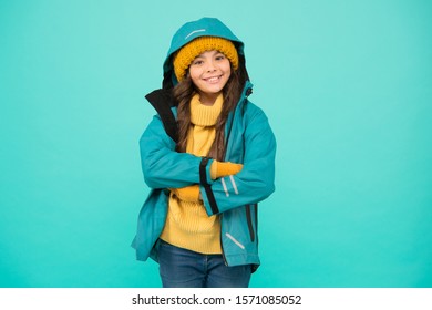 Best Holiday. Happy Girl Anorak Jacket. Winter Holidays. Knitted Clothes Fashion. Cold Season Weather. Outdoor Activity For Kids. Small Girl Sweater. Hat And Gloves Accessory. Warm Clothes Sales.