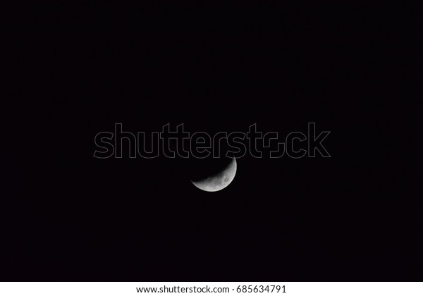 Best moon pic ever . Half moon photo\
captured by Nikon . Cold night. Clear sky with\
moon.