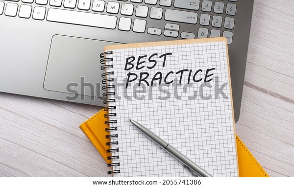 BEST\
PRACTICE text written on a notebook on\
laptop