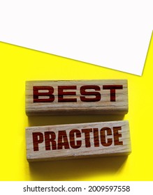 Best Practice Words On Wooden Blocks On Yellow. Business And Healthcare Concept.