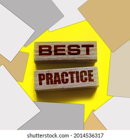 Best Practice Words On Wooden Blocks On Yellow. Business And Healthcare Concept.