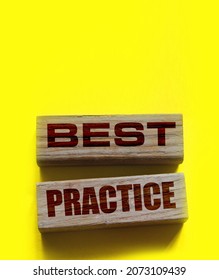 Best Practice Words On Wooden Blocks On Yellow. Business And Healthcare Concept.