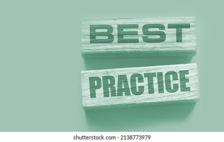 Best Practice Words On Wooden Blocks On Yellow. Business And Healthcare Concept.