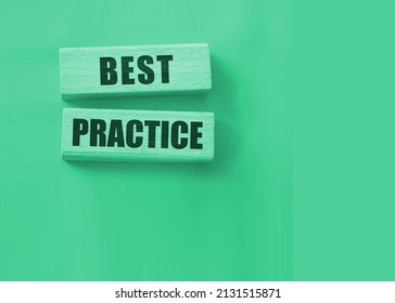 Best Practice Words In Wooden Blocks On Red. Business Or Healthcare Concept.