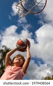 Best Sport For Kids. Child Boy Preparing For Basketball Shooting. Active Kids Lifestyle.