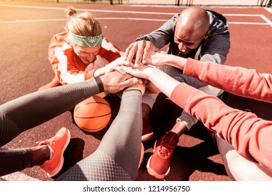 Best Team. Close Up Of Hands Of Nice Positive People Being Held Together