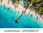 Best tranquility Maldives island, luxury swimming pool resort aerial view. Beautiful sunny pristine sea bay beach background. Summer vacation tourism. Paradise shore palm tree shadow exotic landscape