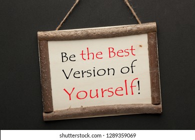 Best Version Of Yourself Text On Wooden Sign Hanging On A Rope On Black Background. Motivational Concept